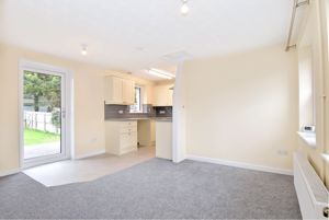 Open plan living room/kitchen- click for photo gallery